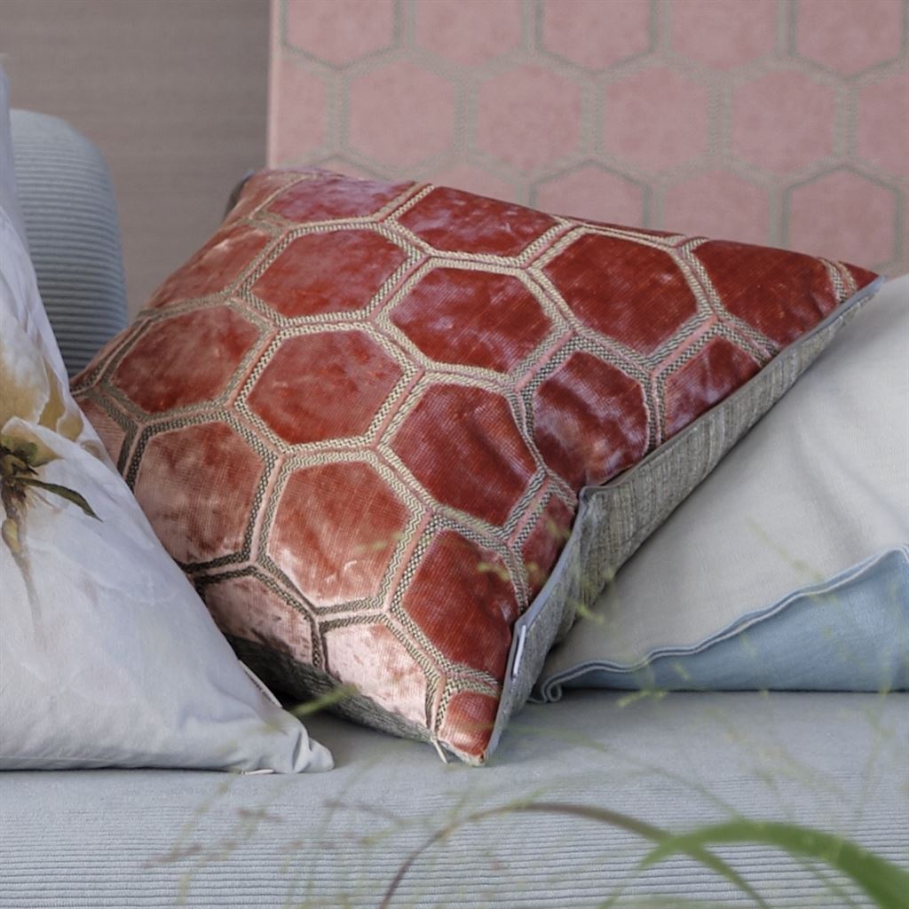 Designers Guild Manipur Coral Decorative Pillow Stacked with Floral Pillows