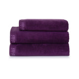 Yves Delorme Iconic Aubergine Towels | Kenzo Terry Towels Stack at Fig Linens and Home