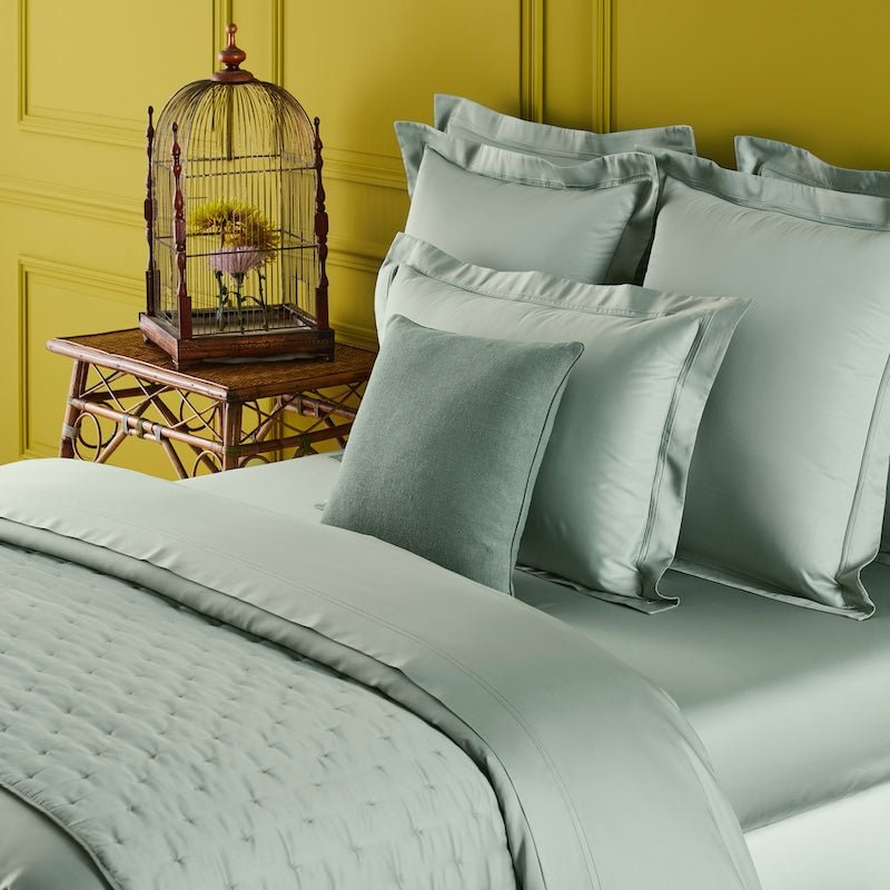 Quilted Coverlet on Bed - Yves Delorme Triomphe Veronese Green quilts - Lifestyle Photo in Bedroom