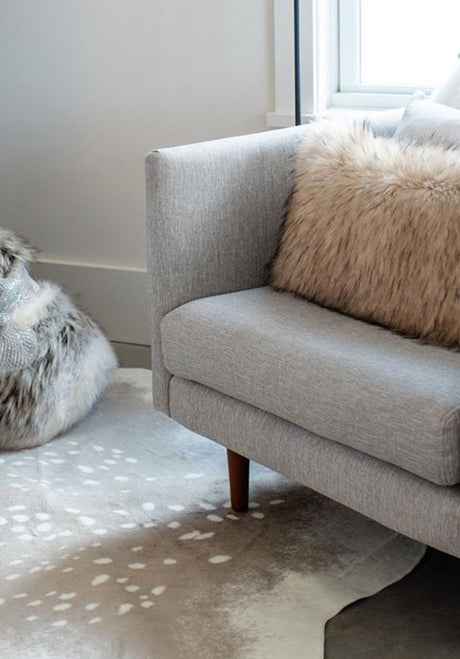 Faux Deer Hide Rug with Sofa | Fig Linens