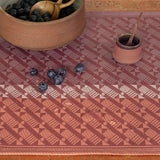 Veine Graphique Red Coated Placemats by Le Jacquard Francais - Detail of Placemat on Table