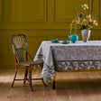 Yves Delorme Tablecloth & Napkins - Parfum Fougere Table Linens shown on table with flowers