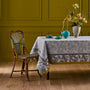 Yves Delorme Tablecloth & Napkins - Parfum Fougere Table Linens shown on table with flowers