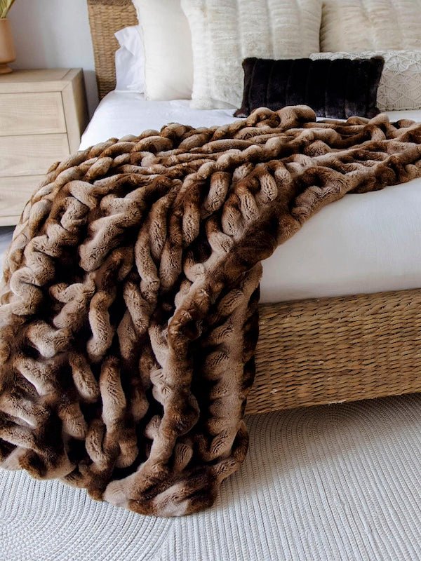 Faux Fur Blanket shown on Bed - Fabulous Furs Caramel Chinchilla Throws at Fig Linens and Home