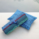 Holi Sapphire Beach Towel and Pillow by Le Jacquard Français