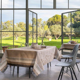 Instant Bucolique Beige Tablecloths by Le Jacquard Français - in home on table with nature outside