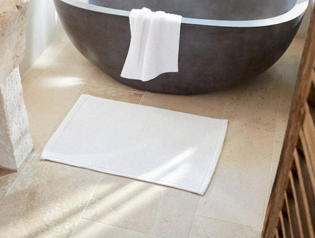 Lifestyle - Alpine White Pebbled Organic Bath Rug by Coyuchi | Fig Linens