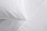 Frette Hotel Cruise White Detail of Stitching on Bed Linens | Fig Linens