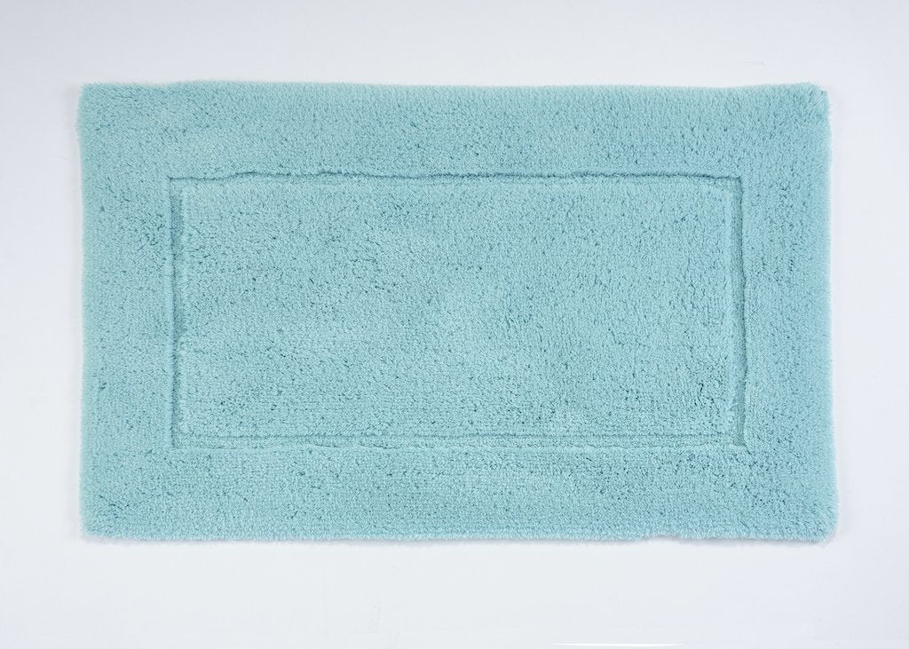 https://www.figlinensandhome.com/cdn/shop/products/fig-linens-abyss-habidecor-must-bath-rug-turquoise-370_0189626c-044b-49c5-a92f-a9b8e223775b_1200x.jpg?v=1692053794