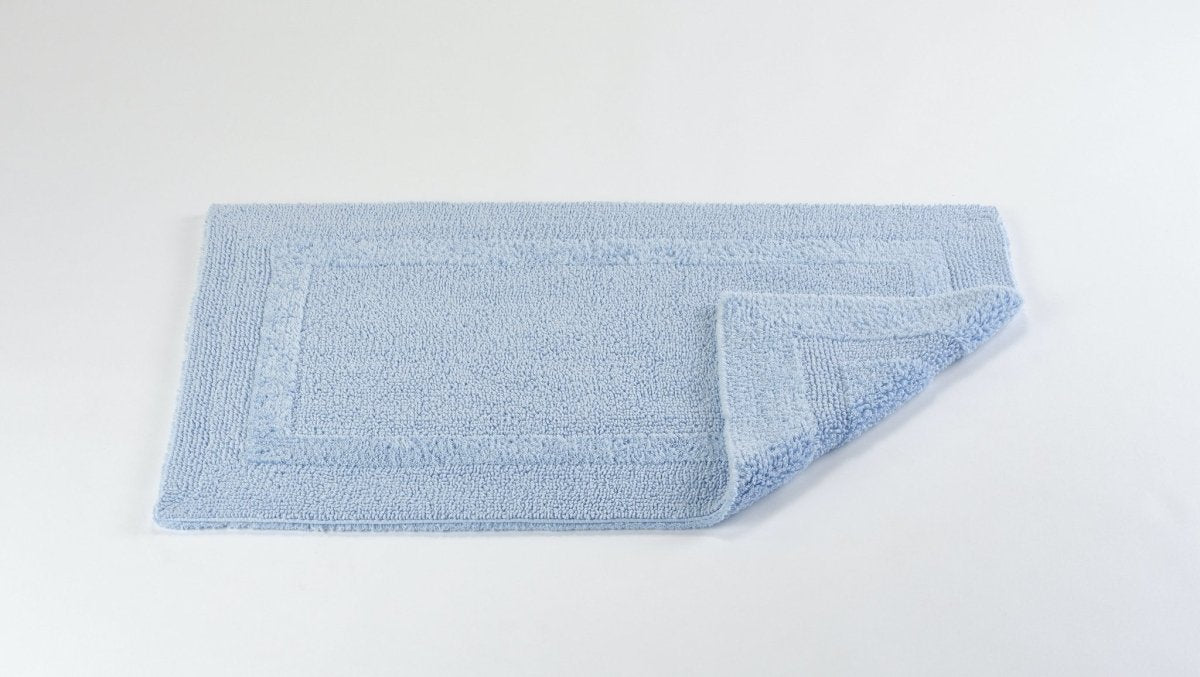 https://www.figlinensandhome.com/cdn/shop/products/fig-linens-abyss-habidecor-reversible-bath-rug-powder-blue-330_0f154884-1df8-4b53-878a-a39572633c00-223849_1200x.jpg?v=1699023750