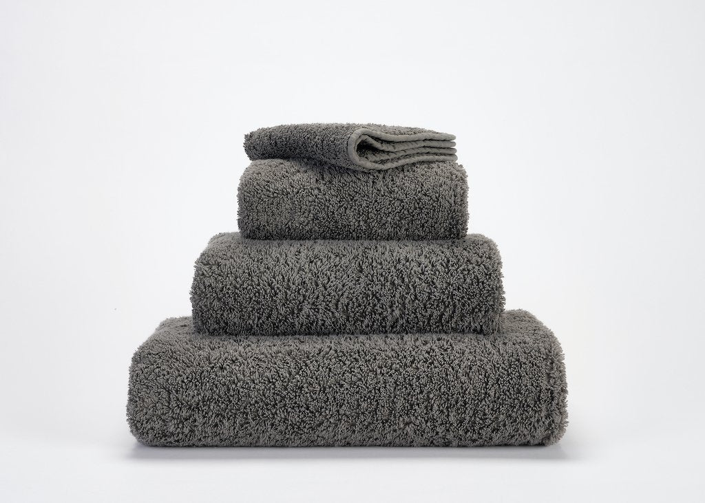 https://www.figlinensandhome.com/cdn/shop/products/fig-linens-abyss-habidecor-super-pile-bath-towels-gris-920_ccf30ba7-875e-4e1b-8bcb-97508e14a47d_1200x.jpg?v=1692055656