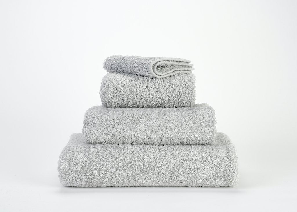 https://www.figlinensandhome.com/cdn/shop/products/fig-linens-abyss-habidecor-super-pile-bath-towels-platinum-992_1200x.jpg?v=1692055552